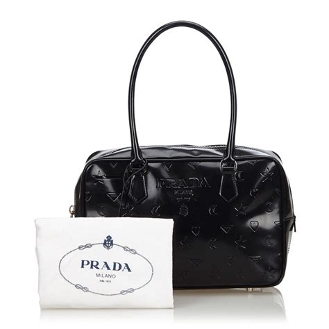 late embossed facing prada logo vintage bag|prada handbags.